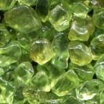 close up of several green peridot gemstones