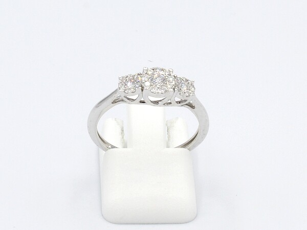 front view of white gold multi-diamond engagement ring on white background