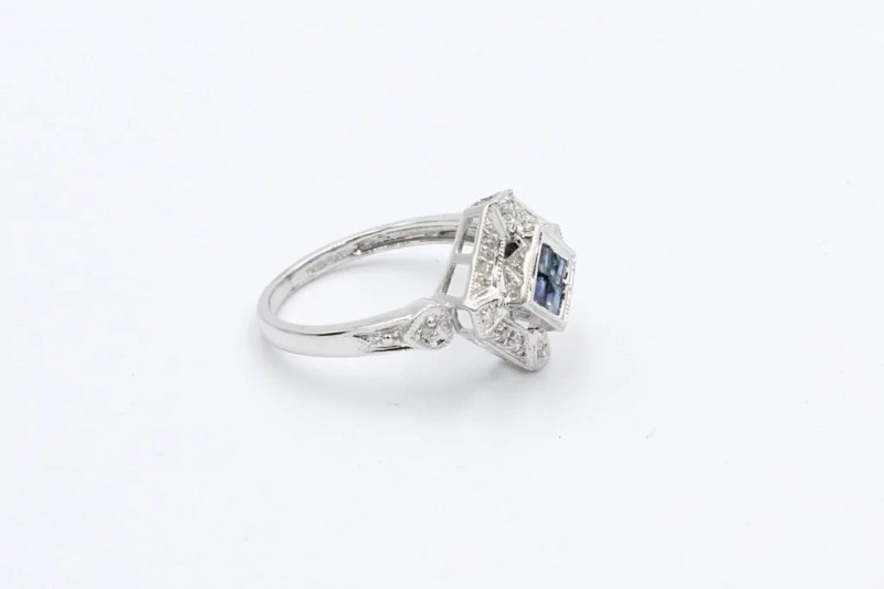 side view of a sapphire and diamond art deco style engagement ring