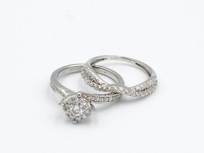 a diamond engagement and wedding ring that fit together