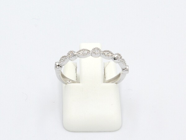 front view of a diamond vintage round and marquee style wedding ring