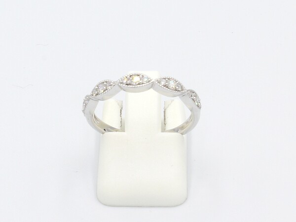 front view of a diamond set vintage style marquee ring