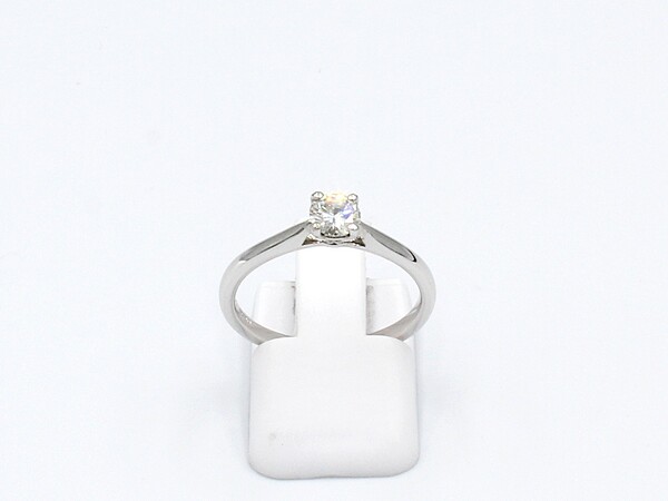 front view of a white gold solitaire diamond ring