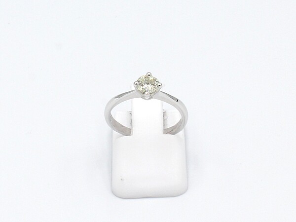 front view of a platinum solitaire diamond ring