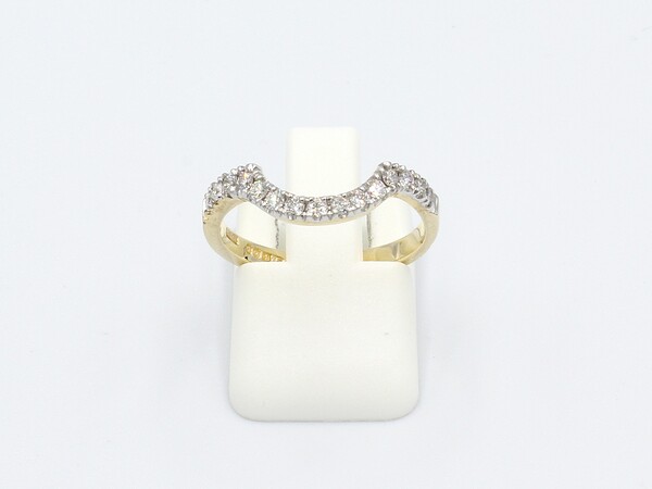 front view of a pave diamond and yellow gold shaped ring