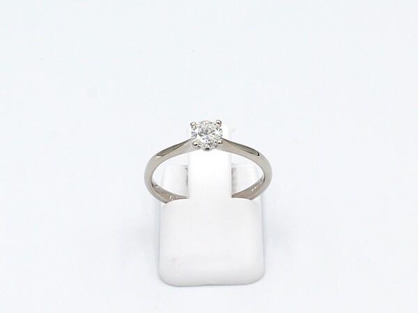 front view of a white gold solitaire diamond ring