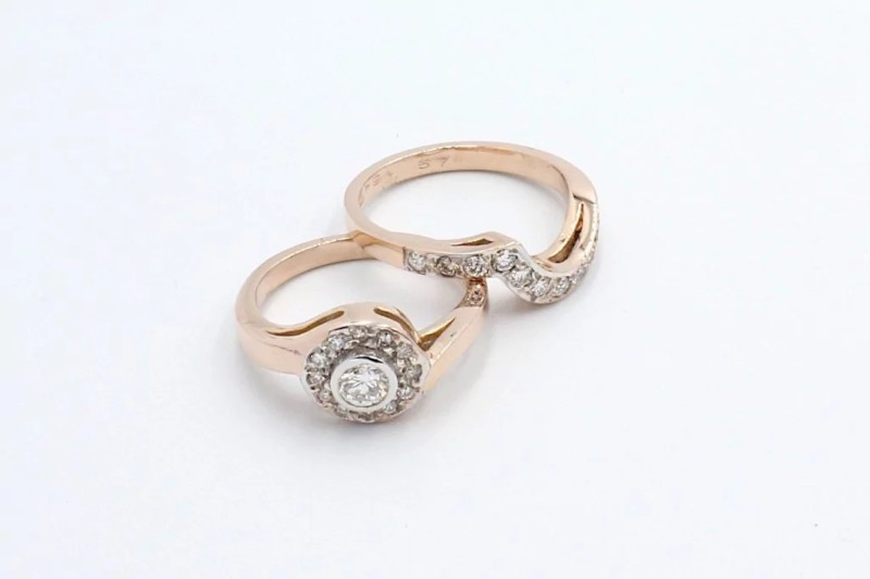 a gold diamond wedding and engagement ring suite