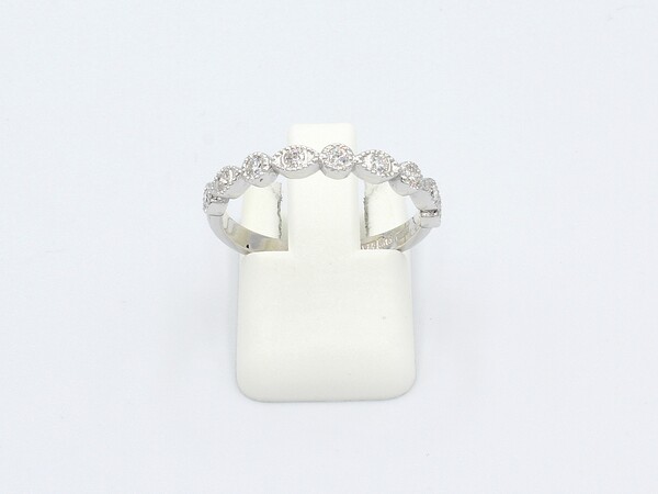 front view of a white gold vintage style marquee, milgrain ring set with diamonds