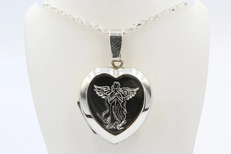 heart shaped cremation jewellery pendant with angel engraving