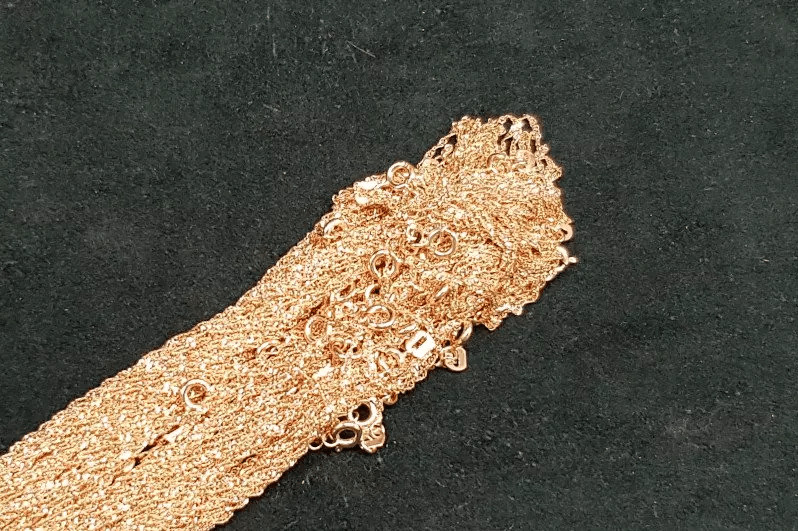 tangled gold chains