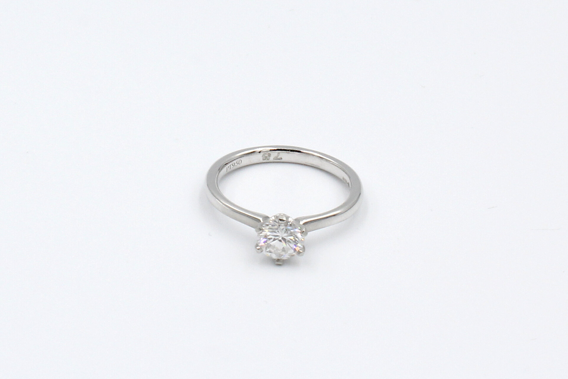 front view of a platinum and diamond engagement ring