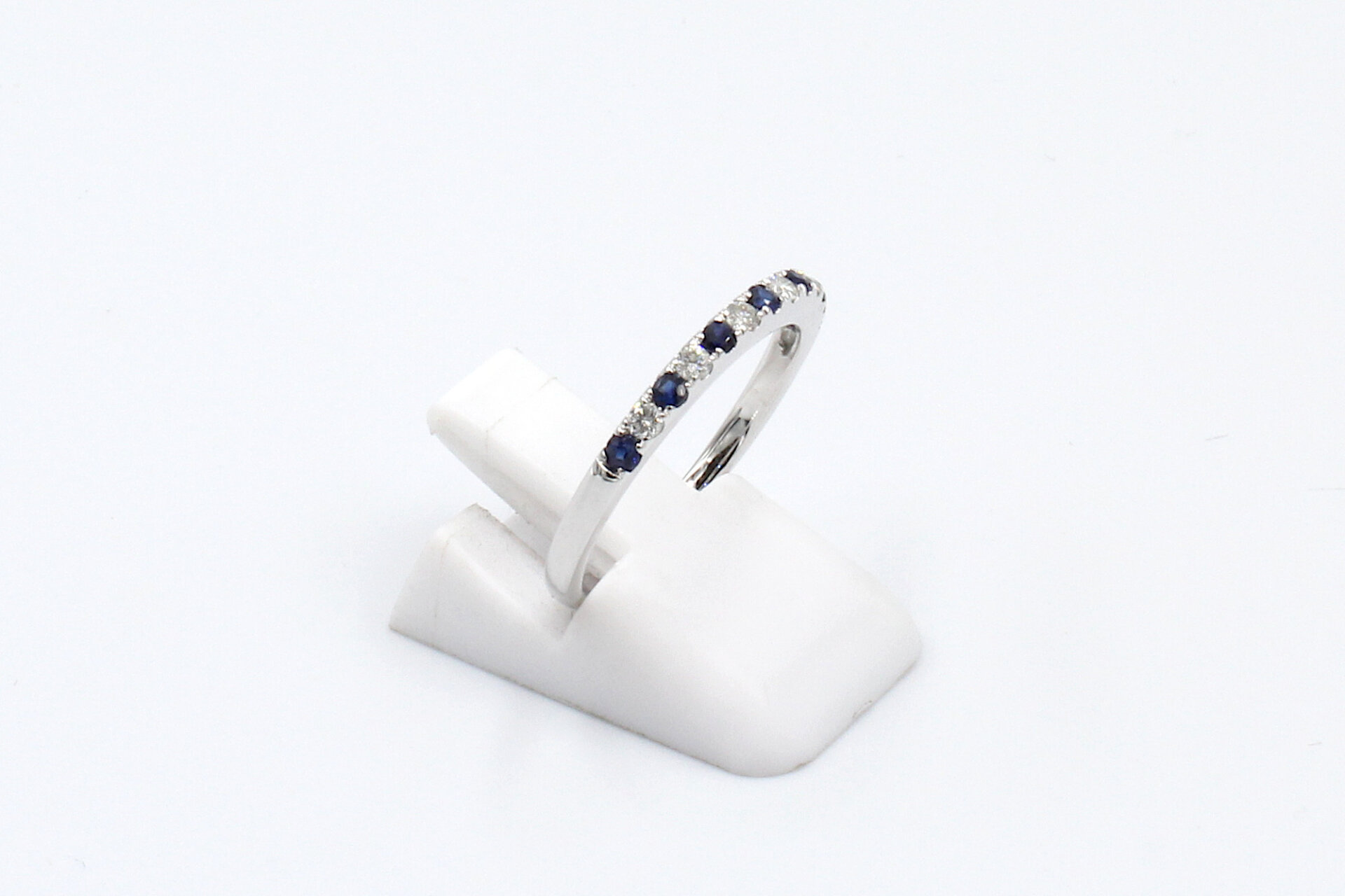 side view of a sapphire and diamond eternity ring