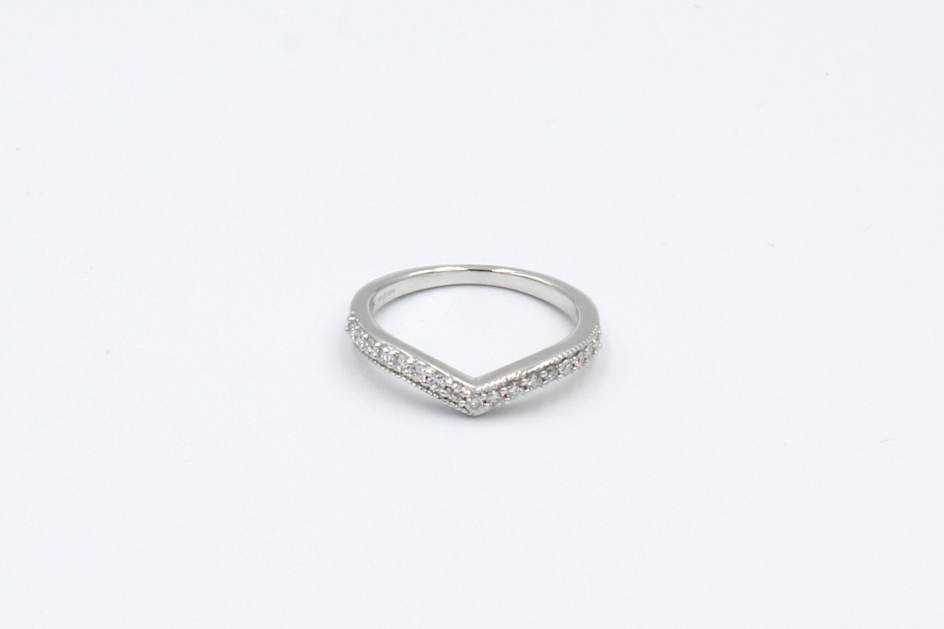 front view of a diamond wishbone wedding ring