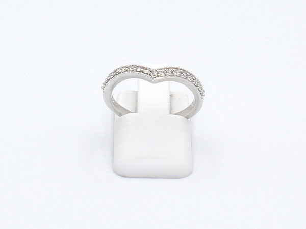 top view of a diamond and white god wishbone wedding ring