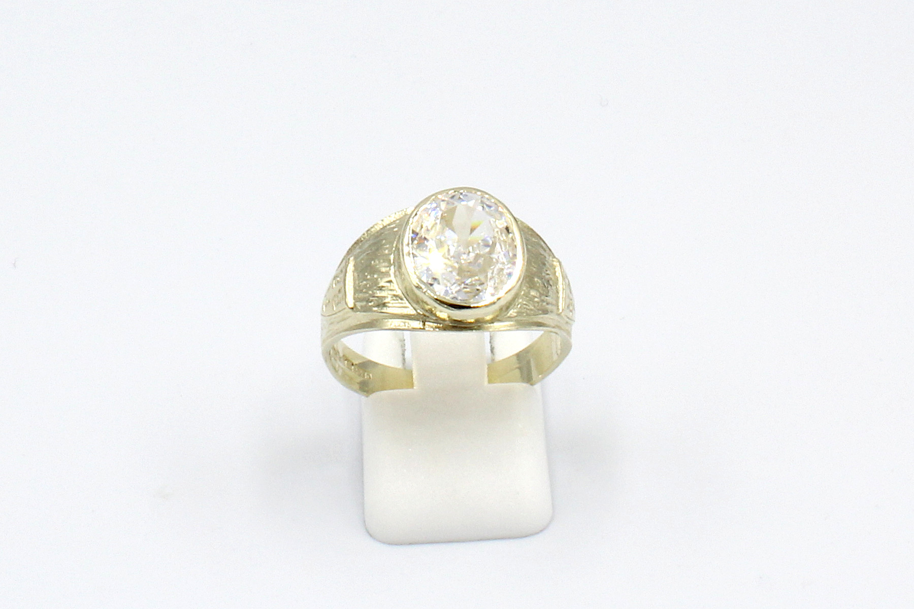 front view of a gold cubic zirconia ring