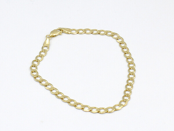 a plain gold curb link bracelet