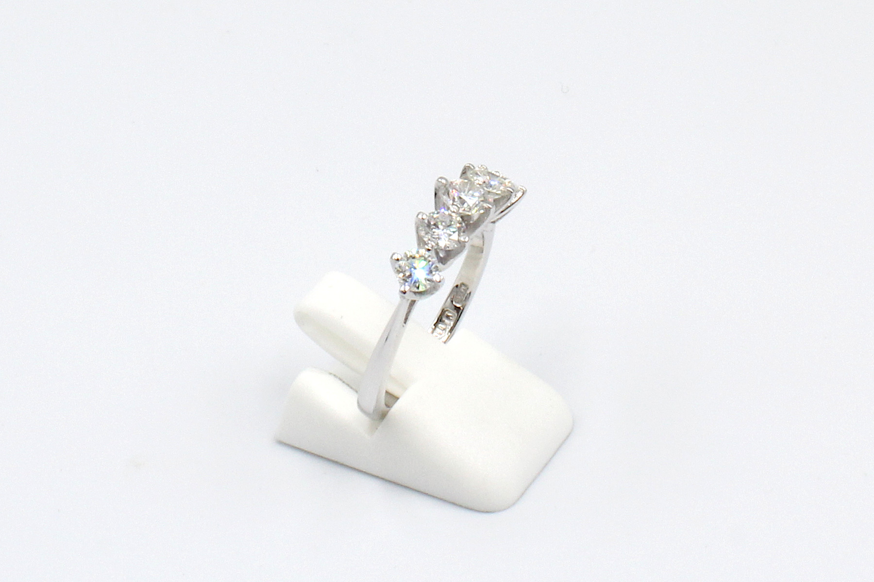 right view of a multi-diamond platinum engagement ring