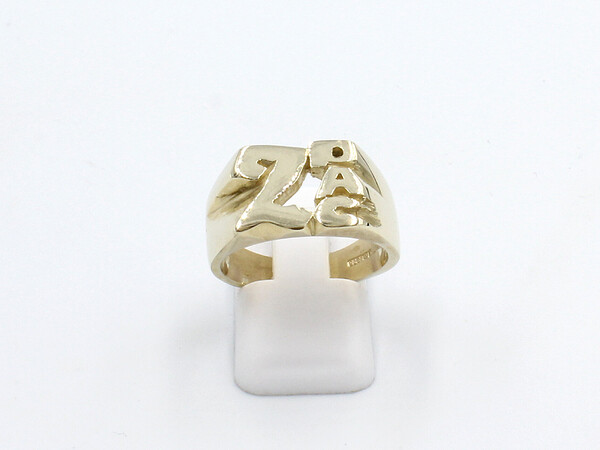 front view of a gold 2pac rapper ring