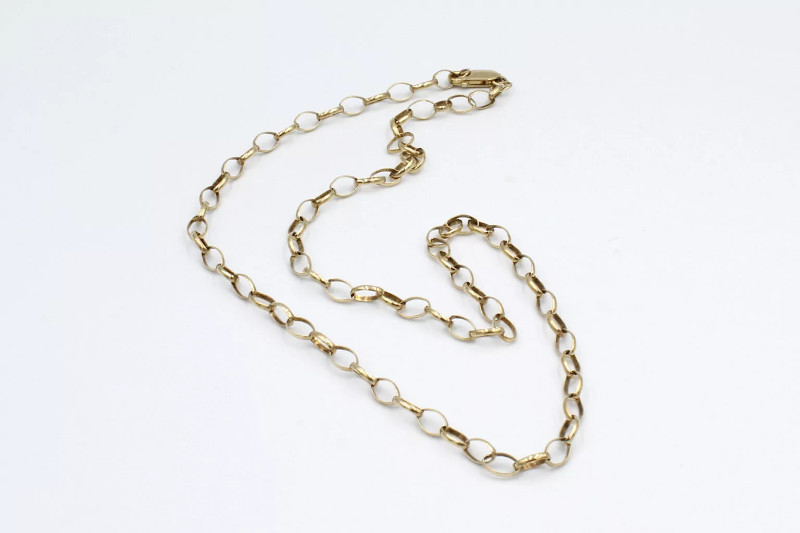 a gold belcher chain on a white background