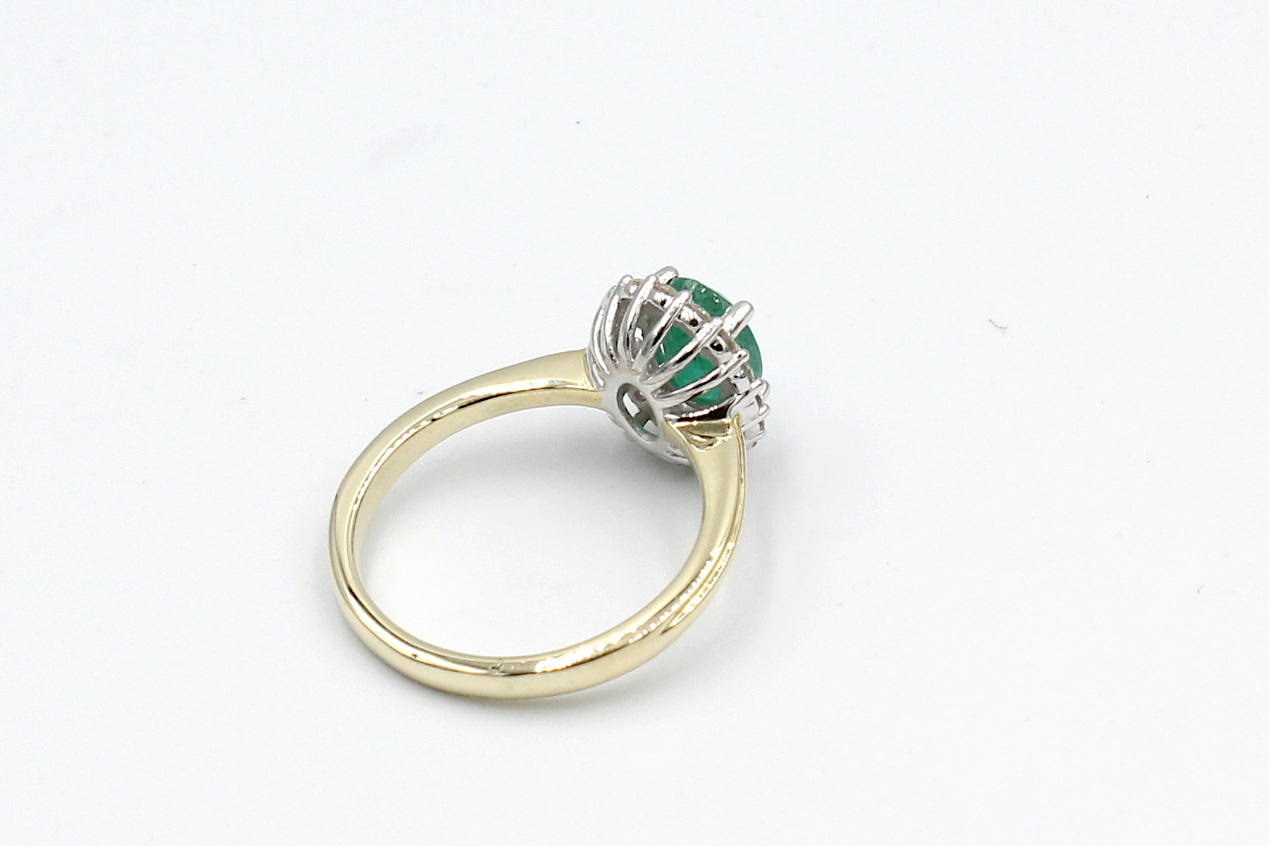 back view gold emerald diamond halo ring