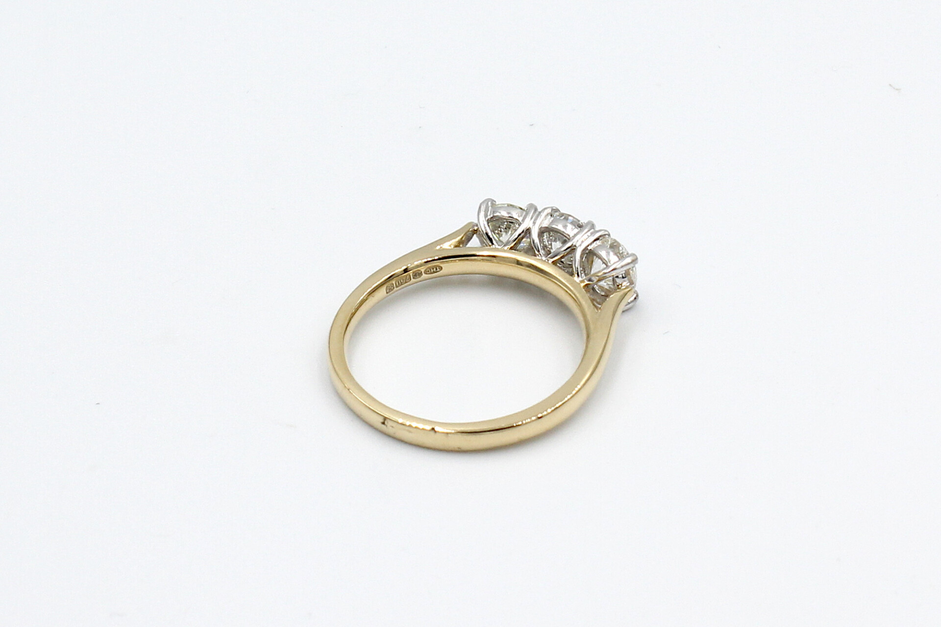 back view of a gold multi-diamond engagement ring