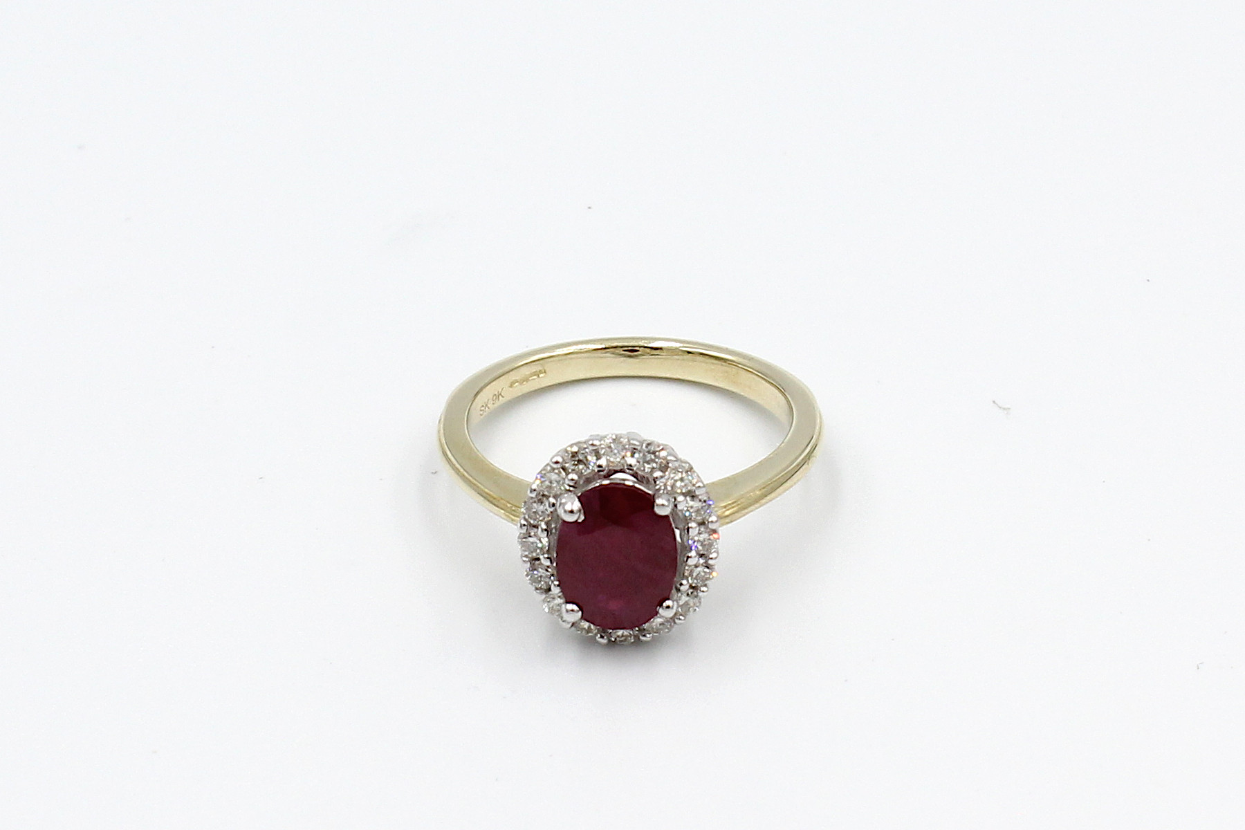 top view ruby diamond halo ring