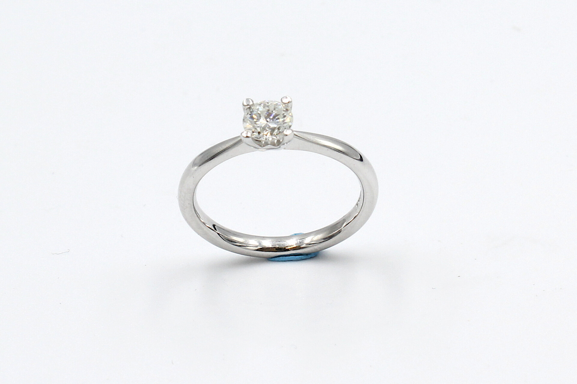 front view of a white gold diamond engagement ring