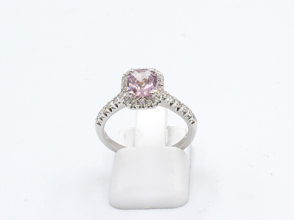 front view of a pink sapphire halo ring