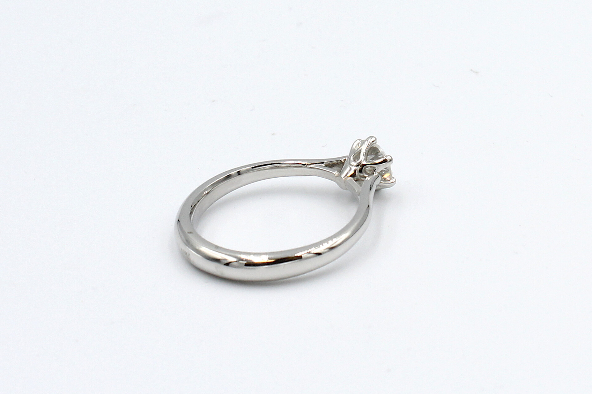 back view of a platinum diamond solitaire ring