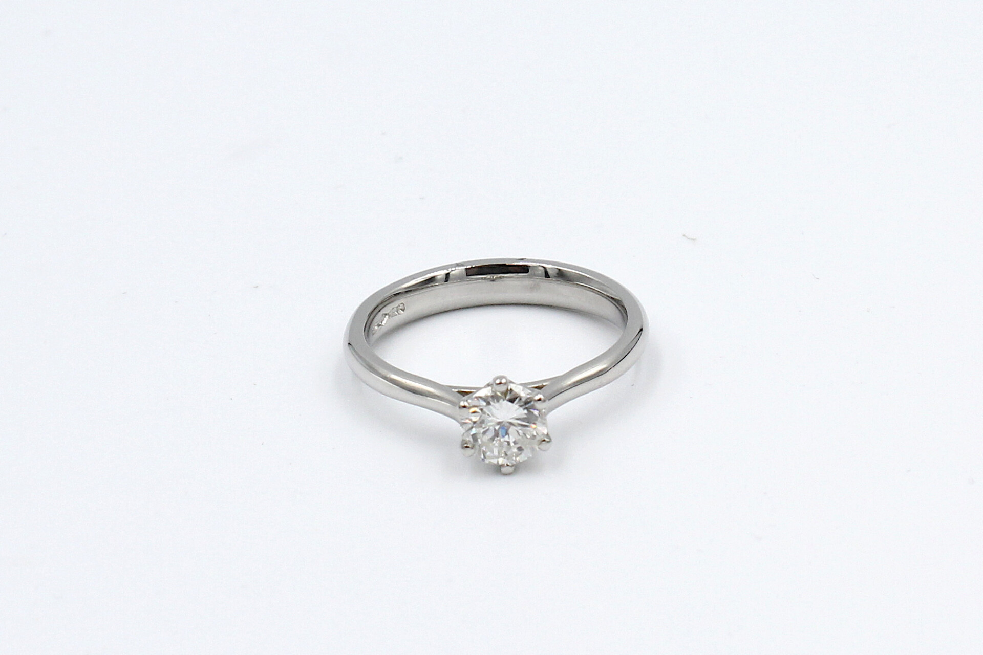 top view of a platinum diamond solitaire ring
