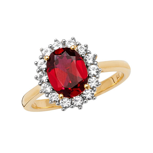 yellow gold ring with ruby and white sapphire oval