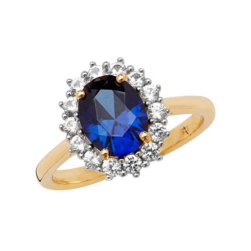 yellow gold ring with blue and white sapphire