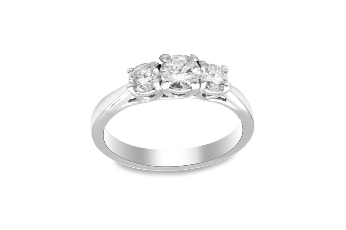 white gold engagement ring set with three diamonds