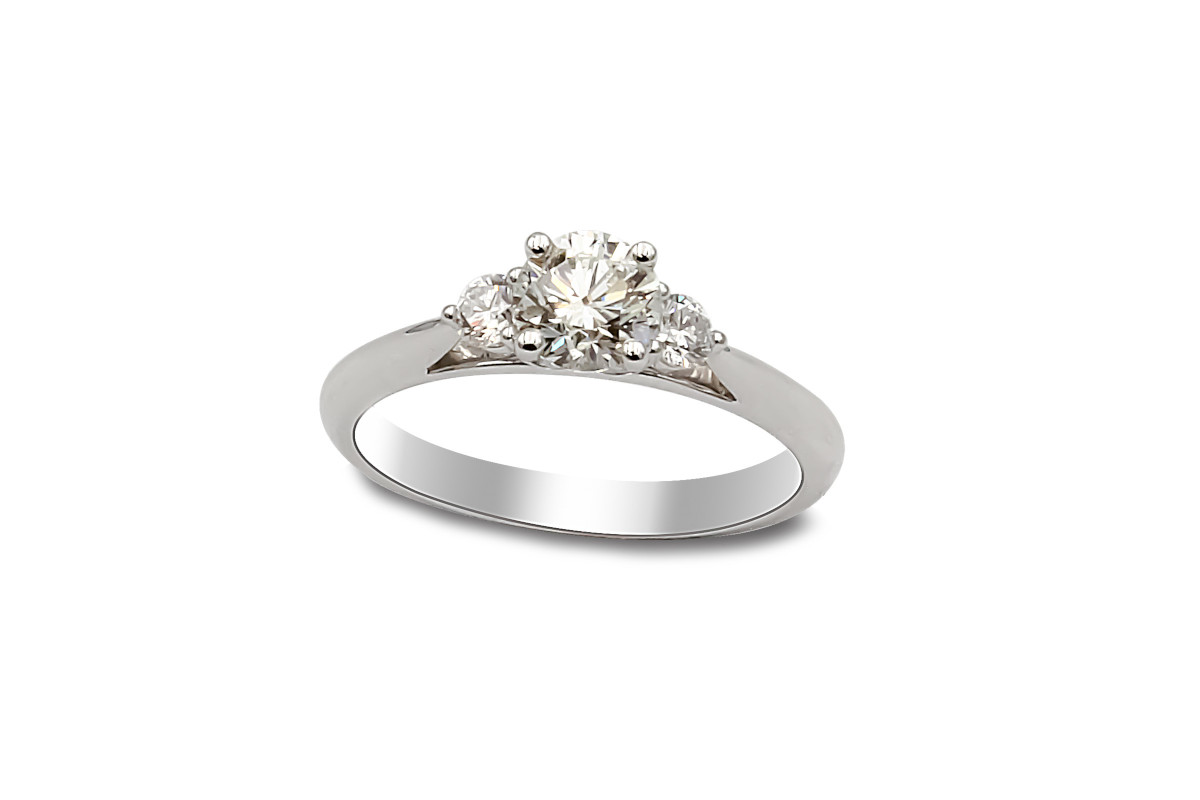 white gold ring with three diamonds