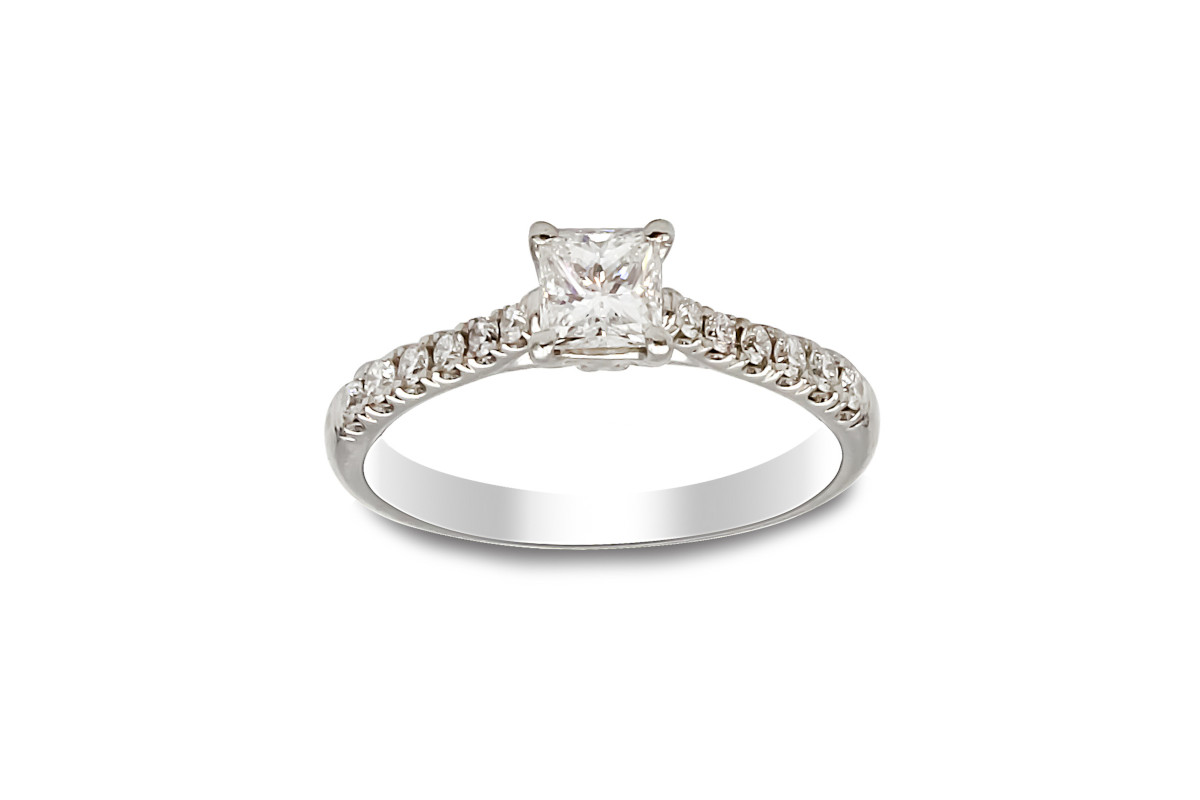platinum ring with princess cut solitaire diamond and diamond set shoulders