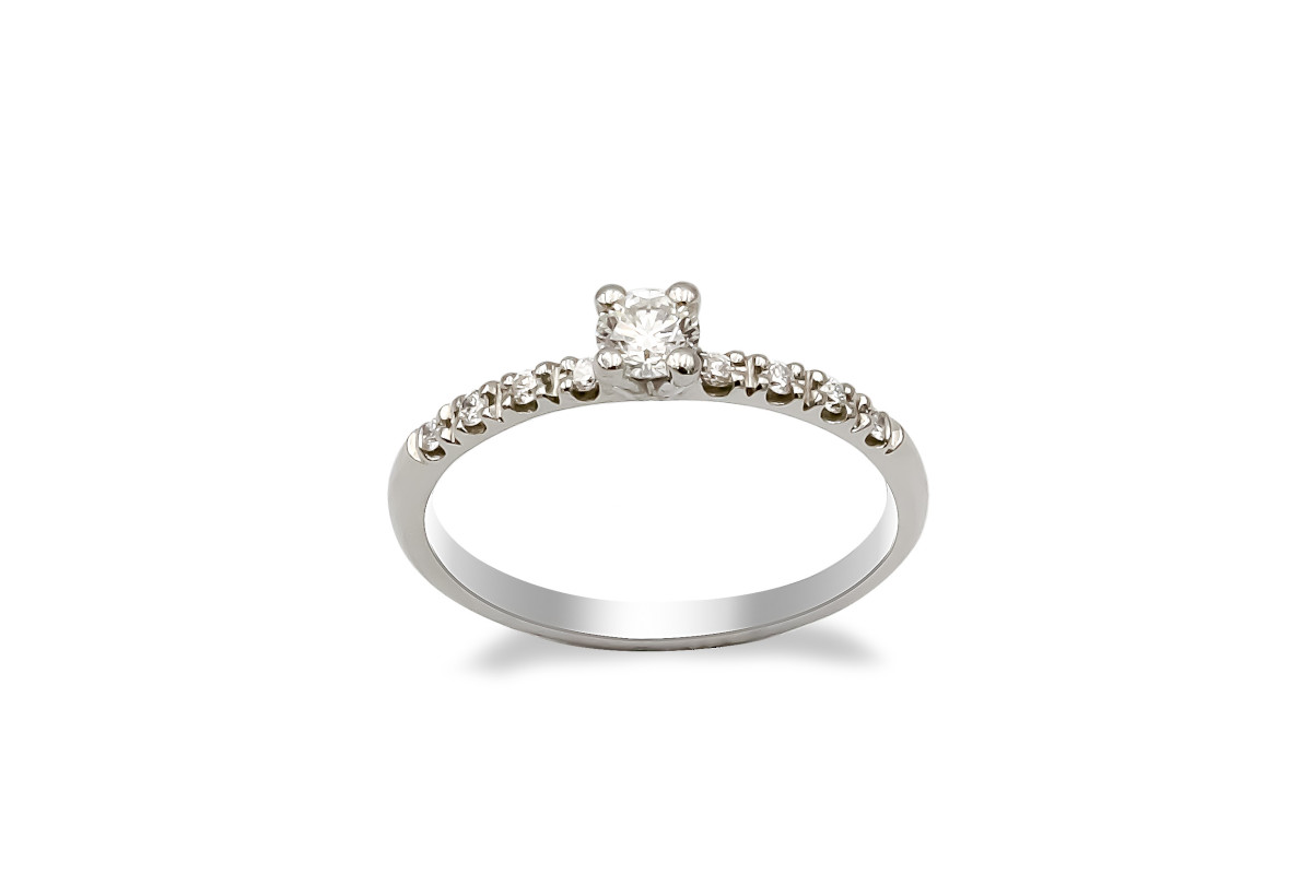solitaire diamond platinum ring with diamond castille shoulders