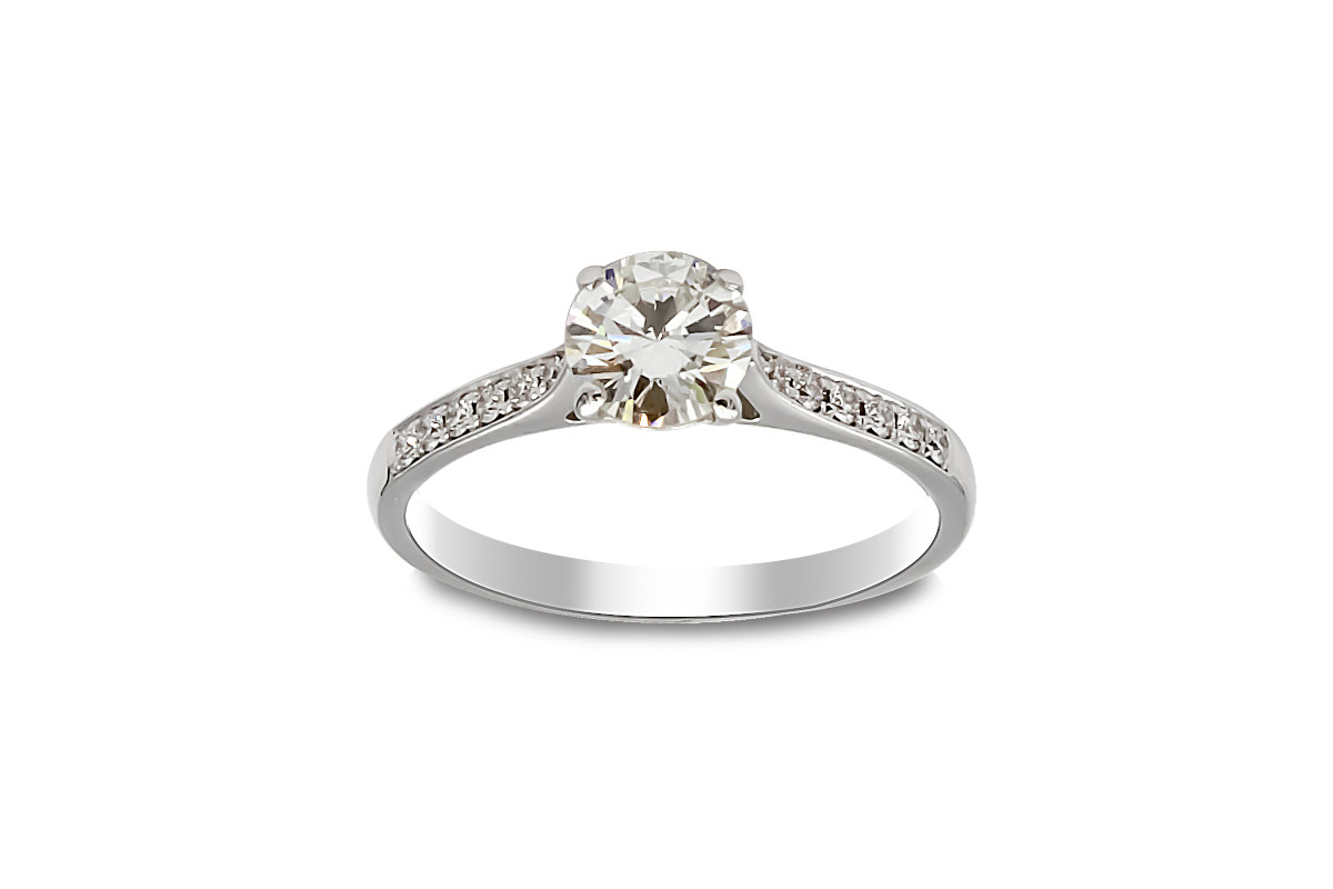 white gold solitaire diamond ring and diamond set shoulders