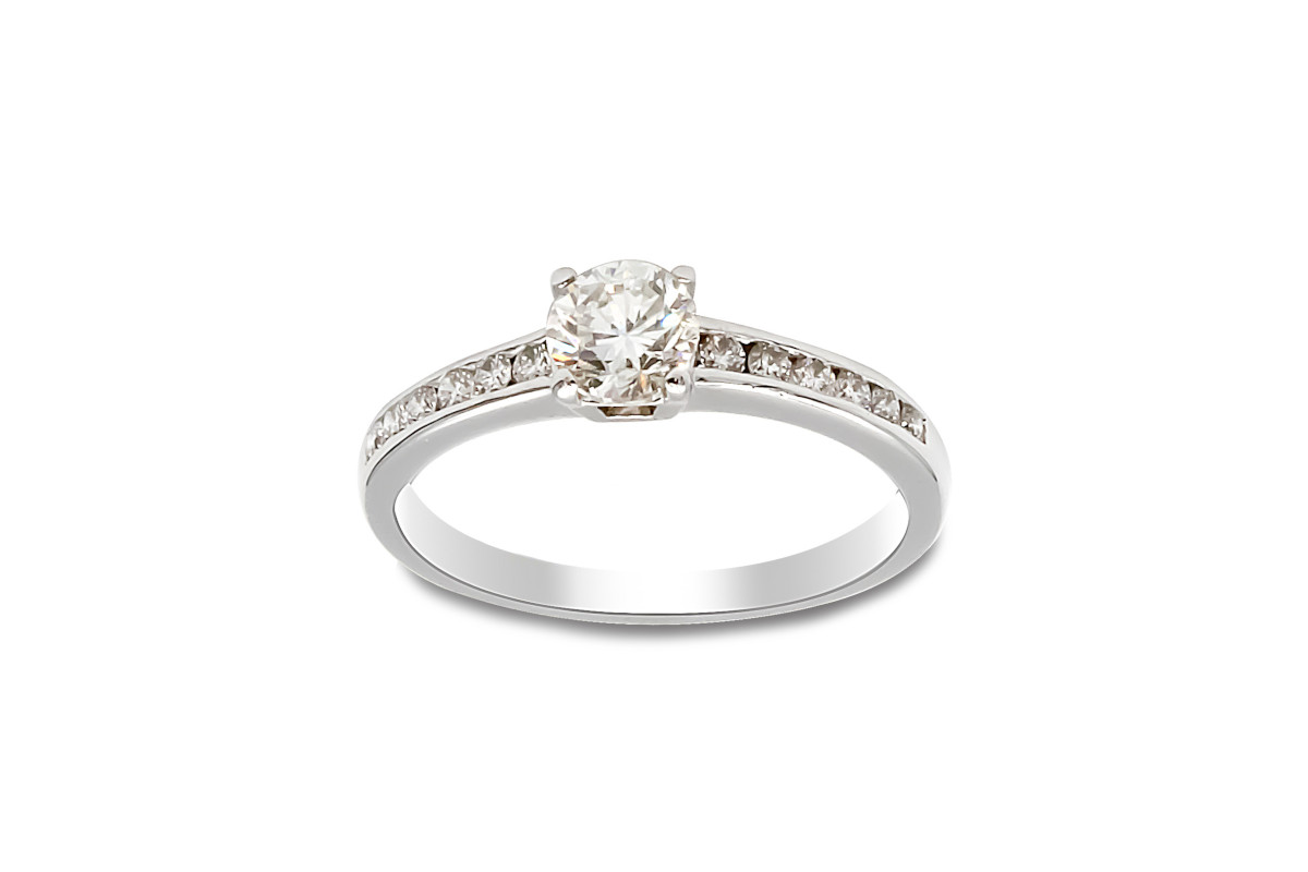 white gold solitaire diamond ring and diamond set shoulders