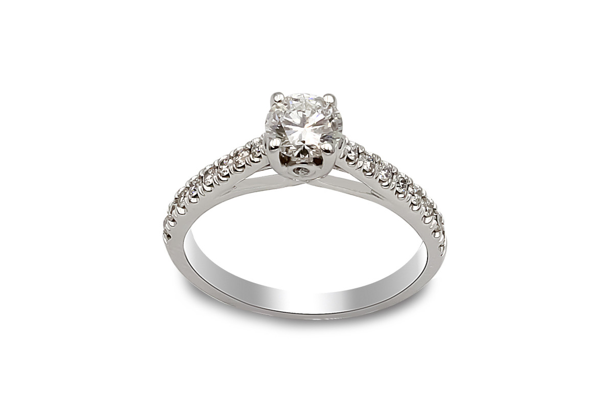 white gold solitaire diamond ring with diamond set shoulders