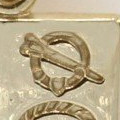 a gold brooch of tara symbol