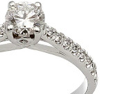 a pave setting on a white gold engagement ring