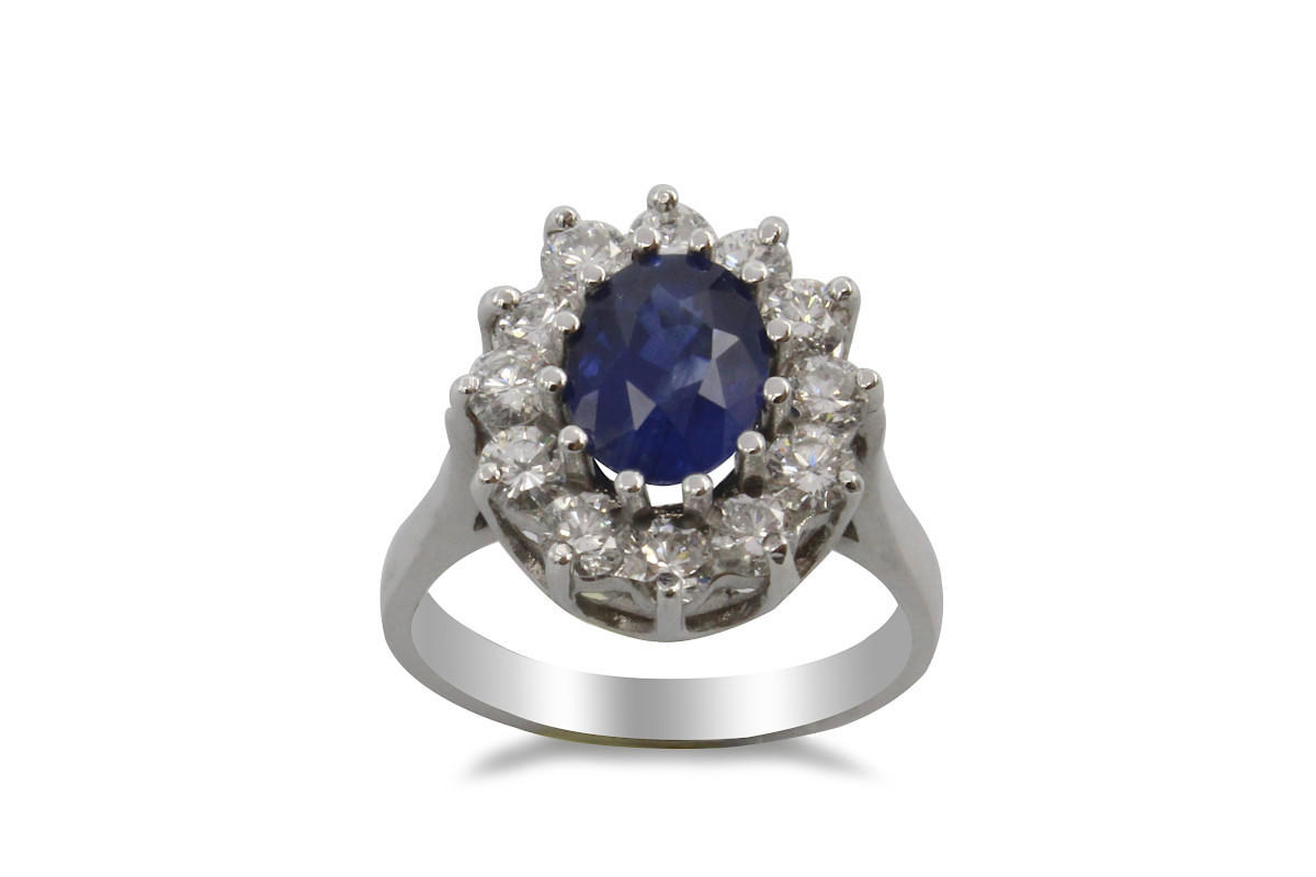 sapphire and diamond cluster ring made from white gold