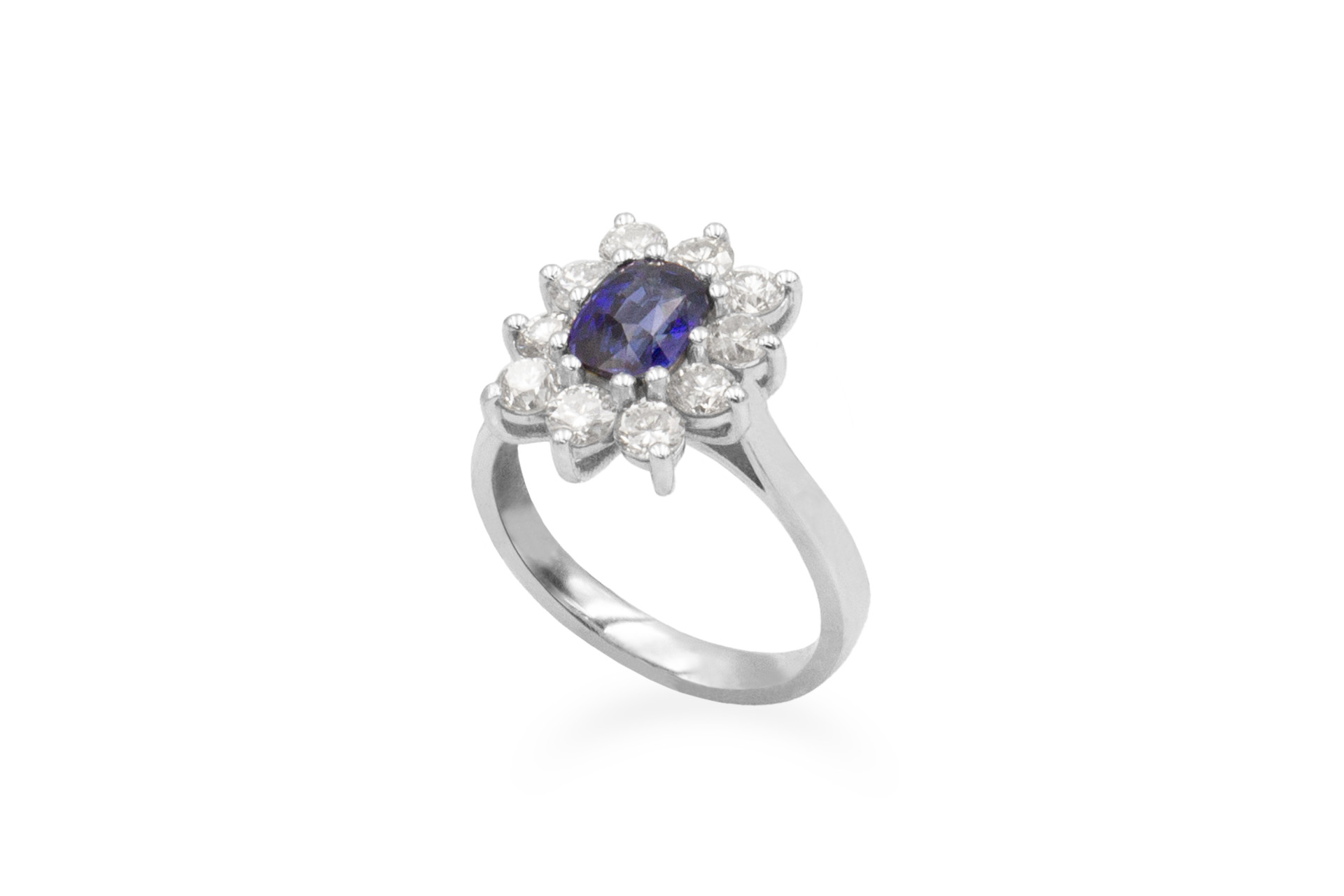 sapphire and diamond cluster ring made from white gold