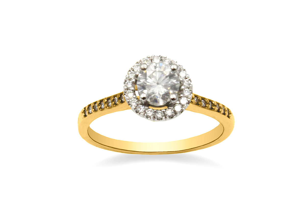 a diamond halo ring in yellow gold
