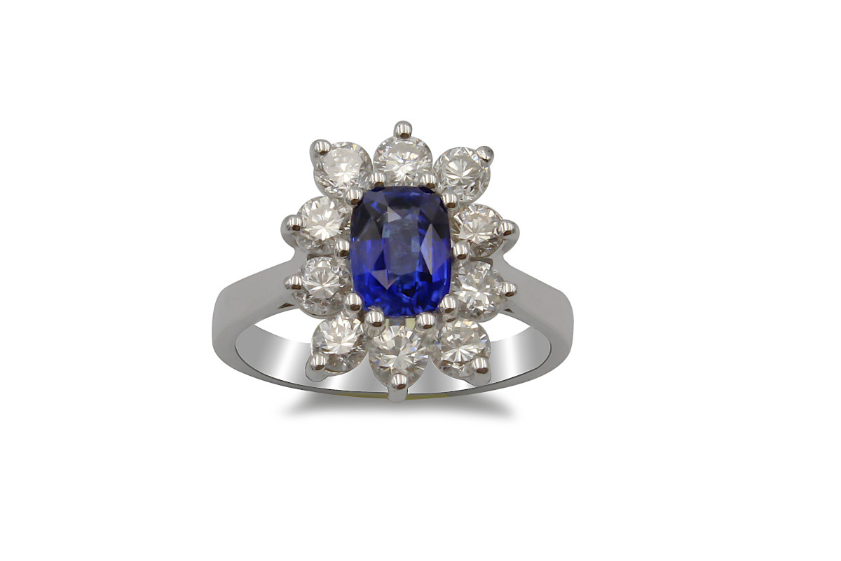 sapphire and diamond cluster ring made from white gold