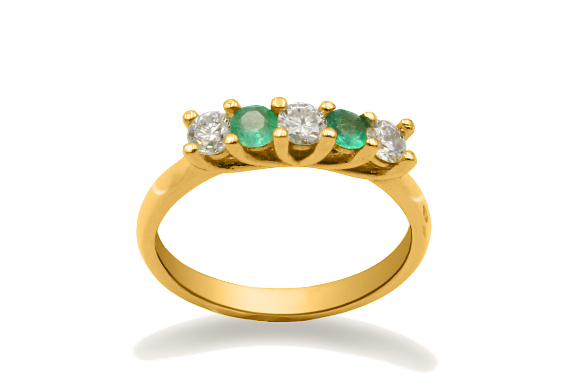 gold multi-stone ring set with diamonds and emeralds