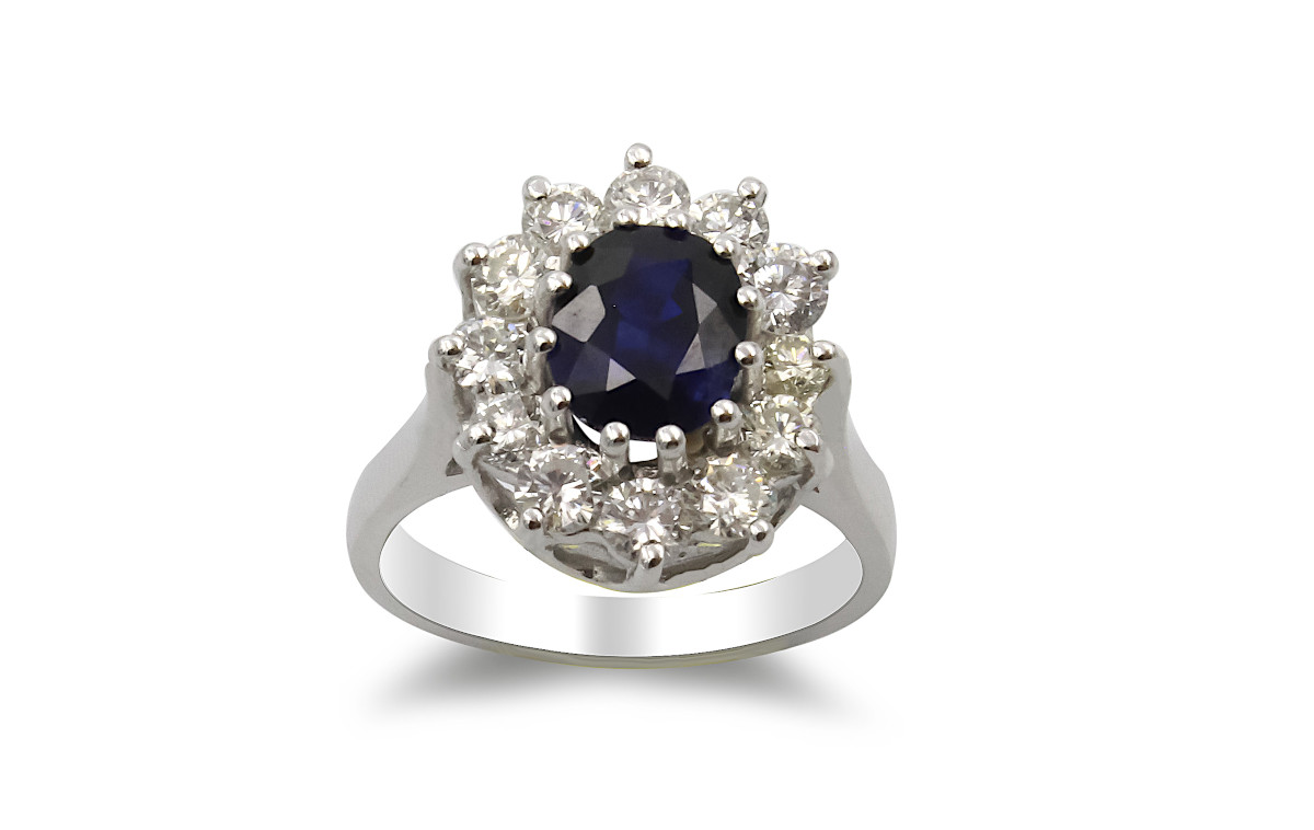 sapphire and diamond cluster ring made from platinum