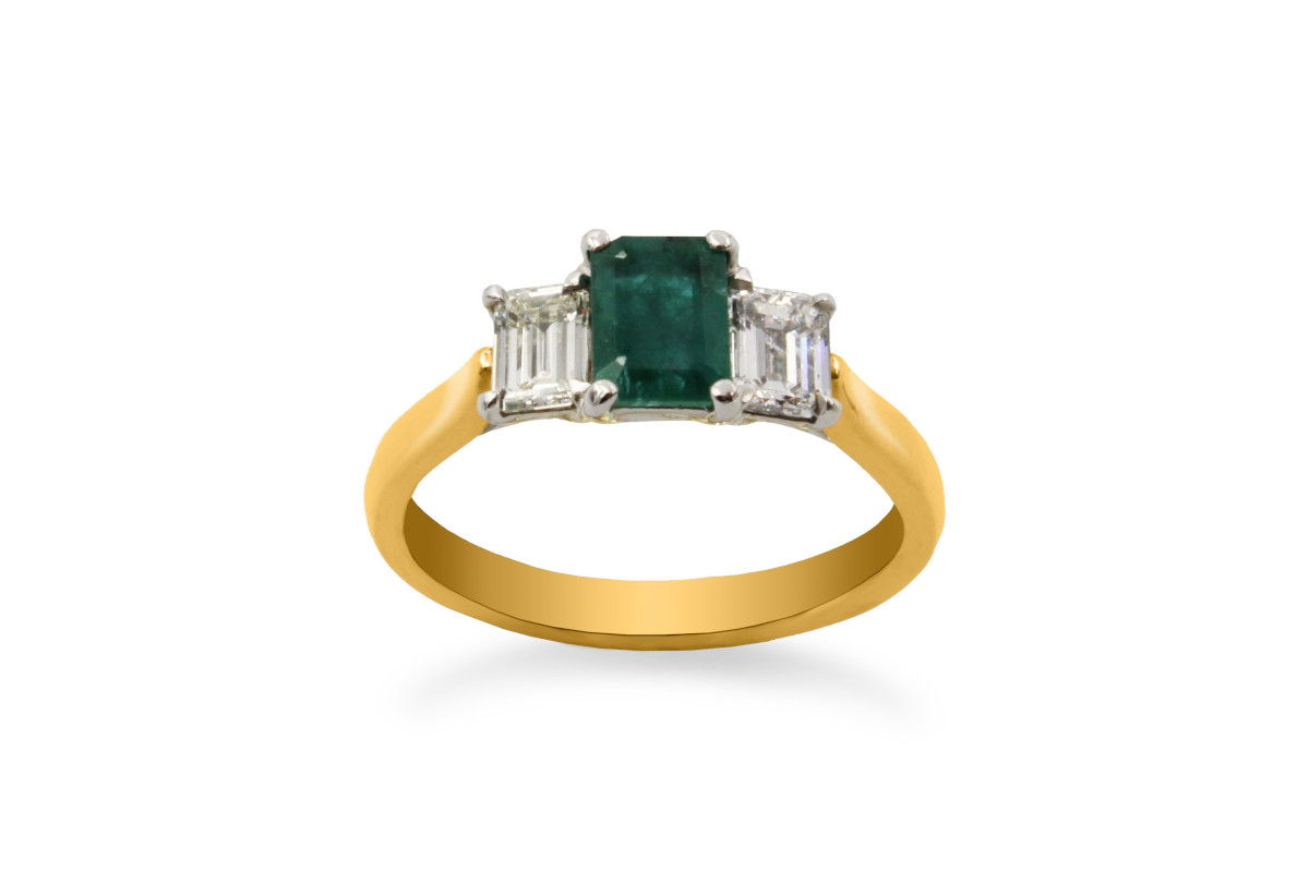 diamond and emerald ring made from yellow gold