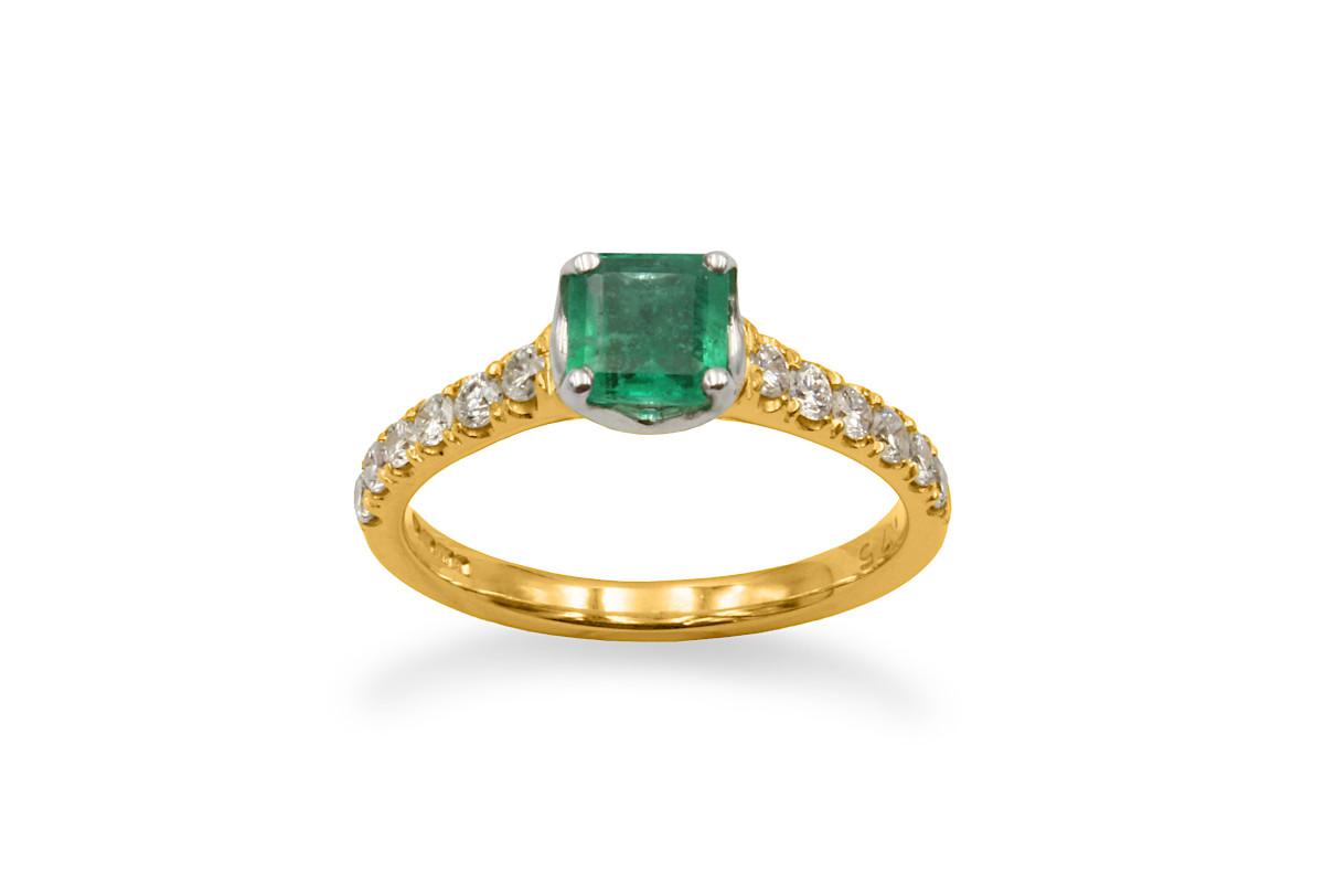 emerald and diamond solitaire engagement ring
