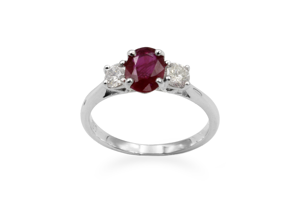 multi-stone white gold ring set with a ruby and diamonds